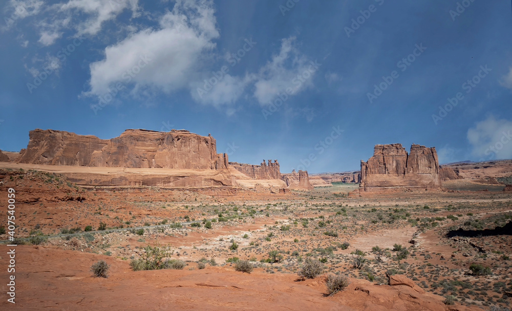 Dazzling Arches National Park in the summertime with sandstone formations on a partly cloudy day in Utah Dazzling Arches National Park in the summertime with sandstone formations on a partly cloudy day in Utah