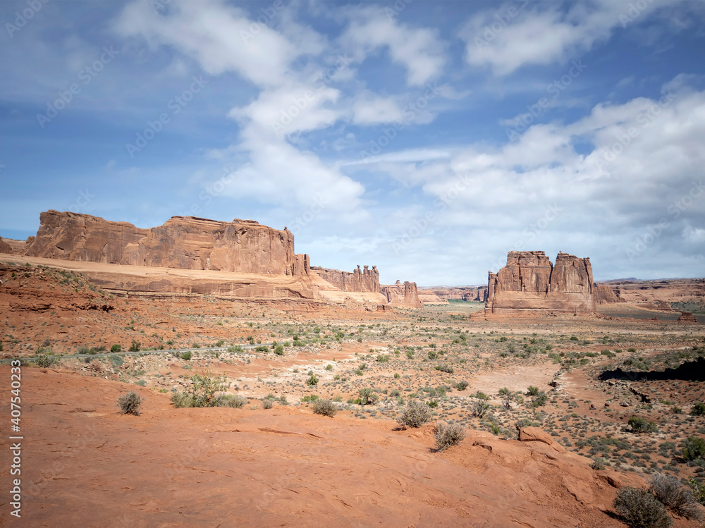 Dazzling Arches National Park in the summertime with sandstone formations on a partly cloudy day in Utah Dazzling Arches National Park in the summertime with sandstone formations on a partly cloudy day in Utah