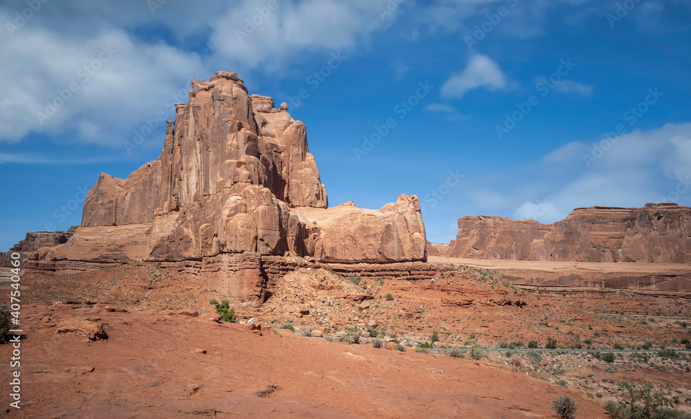 Dazzling Arches National Park in the summertime with sandstone formations on a partly cloudy day in Utah