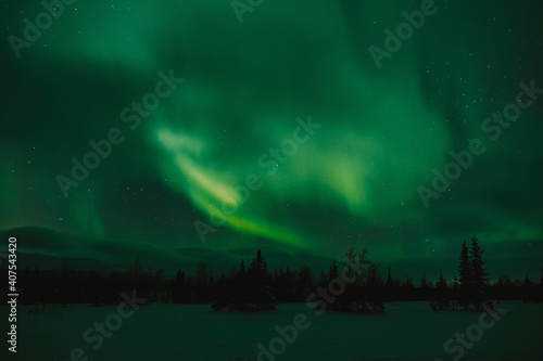 northern lights in the night sky © booleen