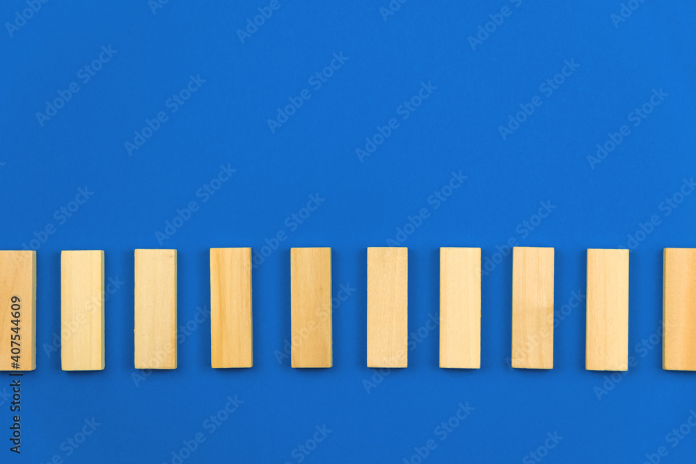 Template for business vision and development concept, blue background, copy space, vertical wooden blocks