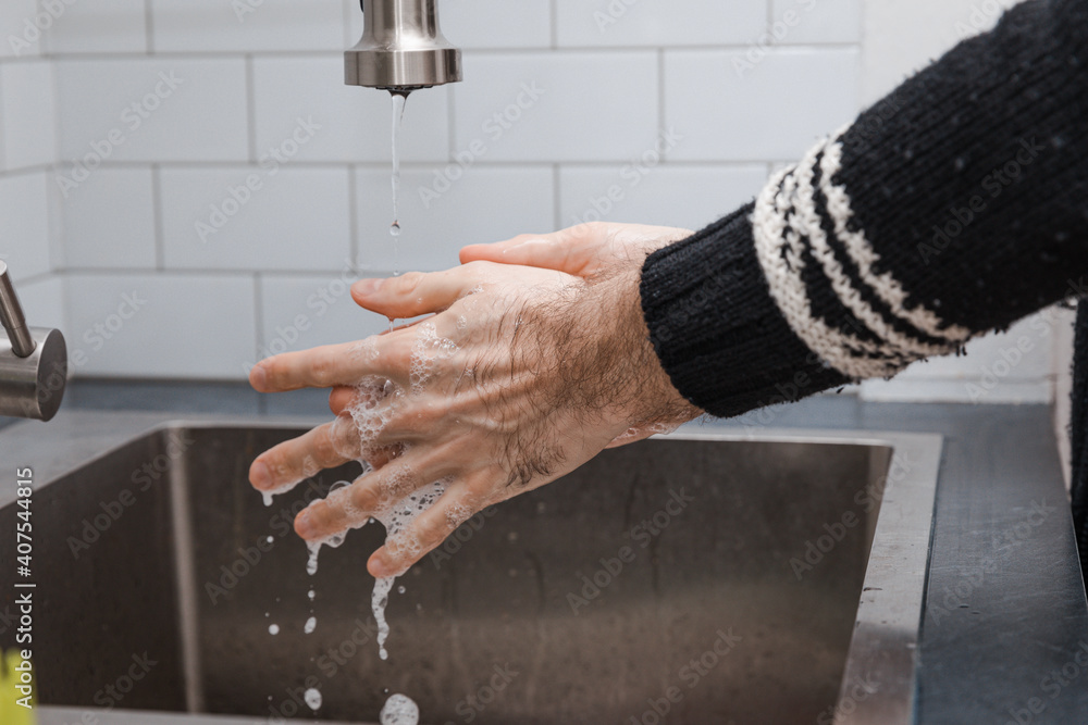 Proper hand washing technique using soap to kill viruses and bacteria for 30 seconds Stock Photo