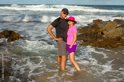 Couple enjoying themselves at Resende Beach in the small town of Itacare, Bahia, Brazil photo