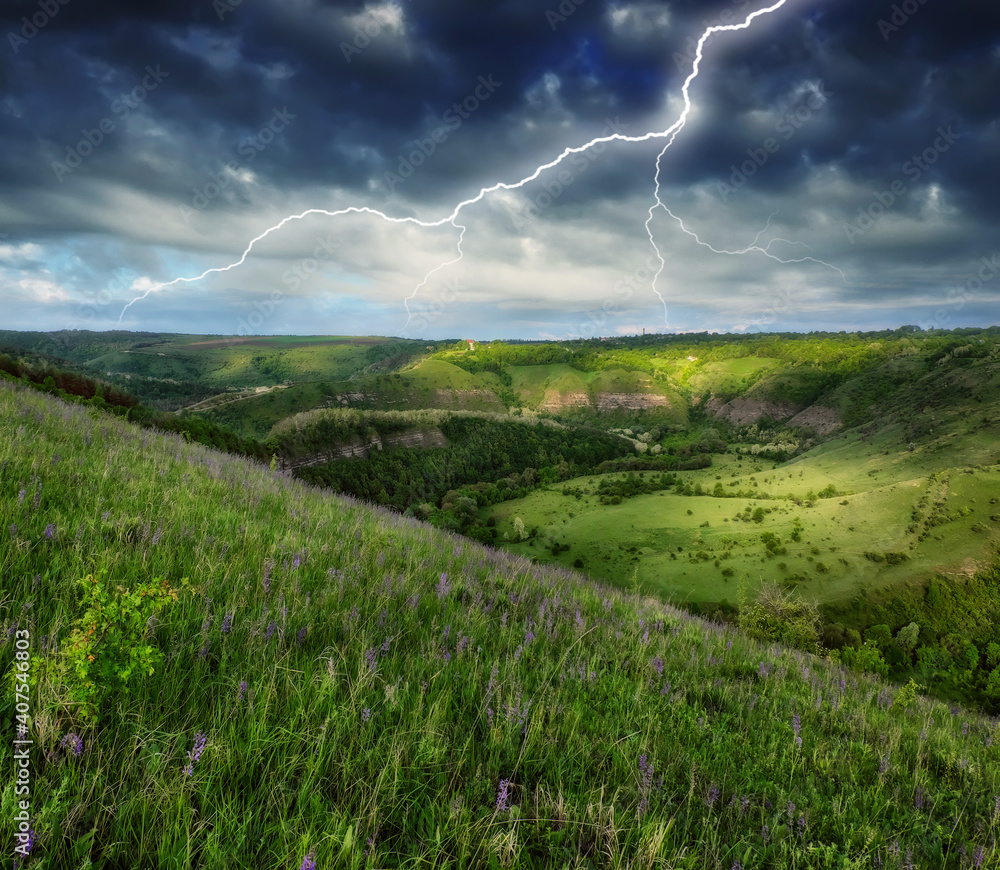 lightning over the meadow. stormy sky over rural landscape lightning over the meadow. stormy sky over rural landscape