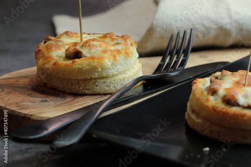 A platter of Cheesy Mushroom croustades or Cheesy Mushroom Discs photo