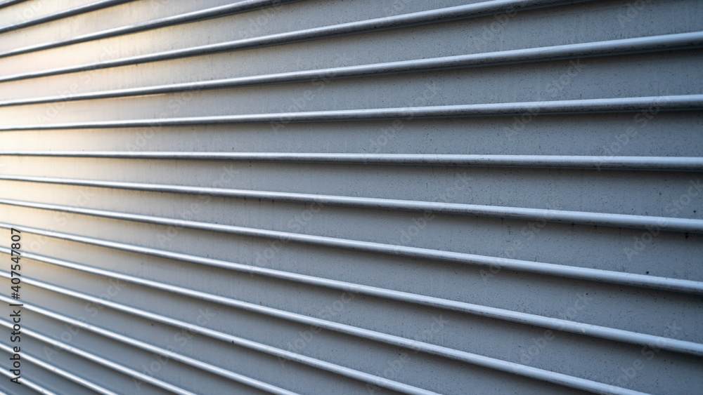 Metal garage door from a side angle. Metal garage door from a side angle.