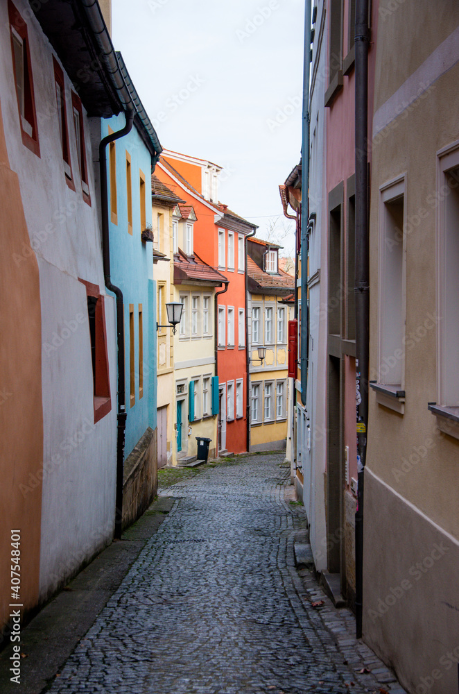 View into a narrow alley of the World Heritage city of Bamberg. High quality photo