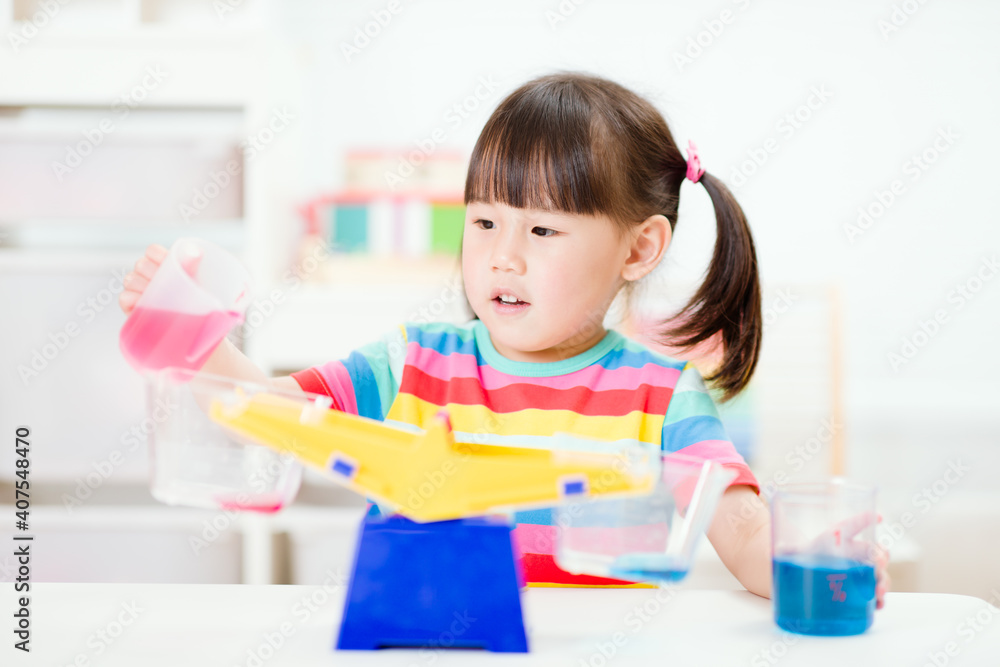 young girl play balance toy for homeschooling young girl play balance toy for homeschooling