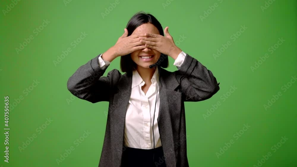 woman in business uniform covering eyes by hands. Surprised to see what is ahead woman in business uniform covering eyes by hands. Surprised to see what is ahead