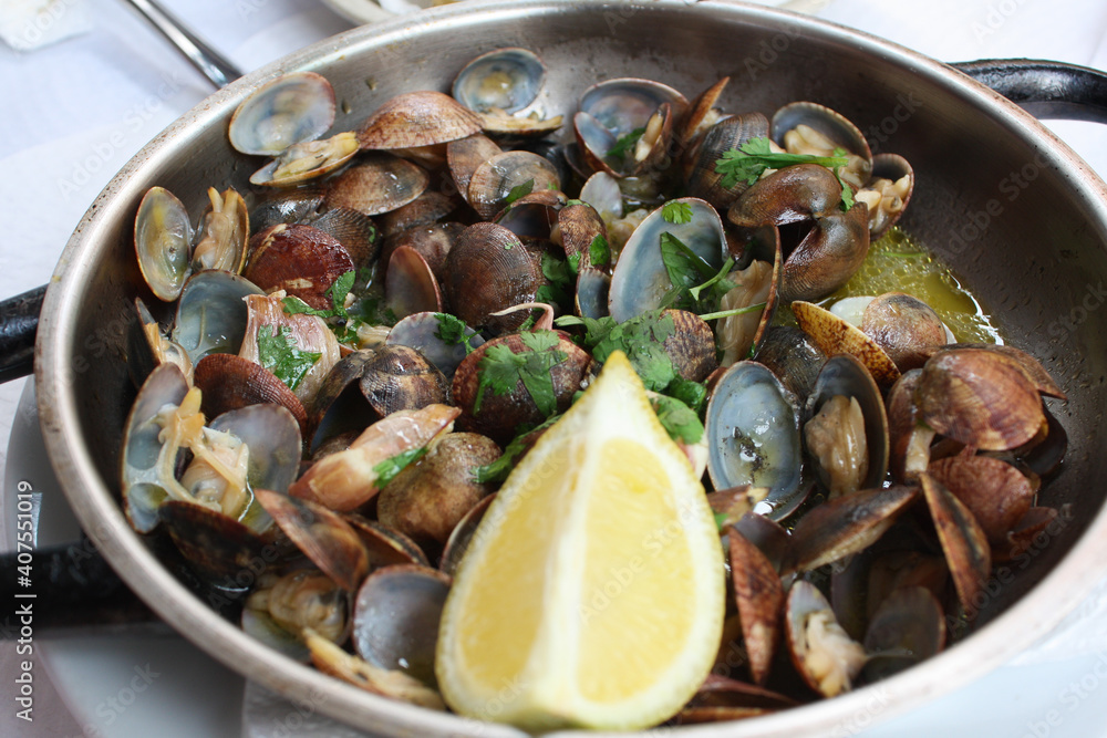 Amêijoas à Bulhão Pato, traditional Portuguese dish Amêijoas à Bulhão Pato, traditional Portuguese dish