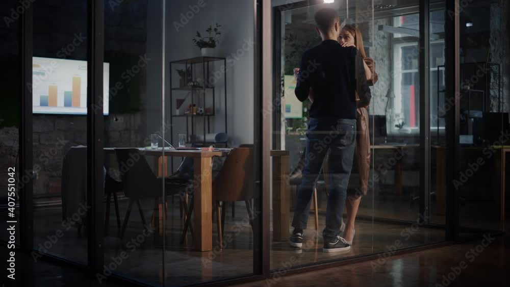 Man and Female Managers and Work Colleagues Dance in a Meeting Room. A Shy Clerk Wins the Affections of His Strict, Career-Driven Boss, Who Begins to Loosen Up After Their Unlikely Romance Begins. Man and Female Managers and Work Colleagues Dance in a Meeting Room. A Shy Clerk Wins the Affections of His Strict, Career-Driven Boss, Who Begins to Loosen Up After Their Unlikely Romance Begins.