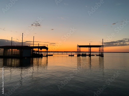 sunset through boathouses