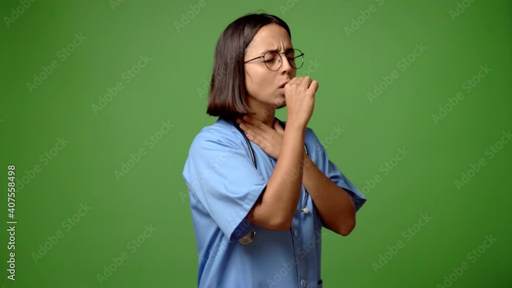 Woman with nurse uniform is suffering with cough and feeling bad Woman with nurse uniform is suffering with cough and feeling bad