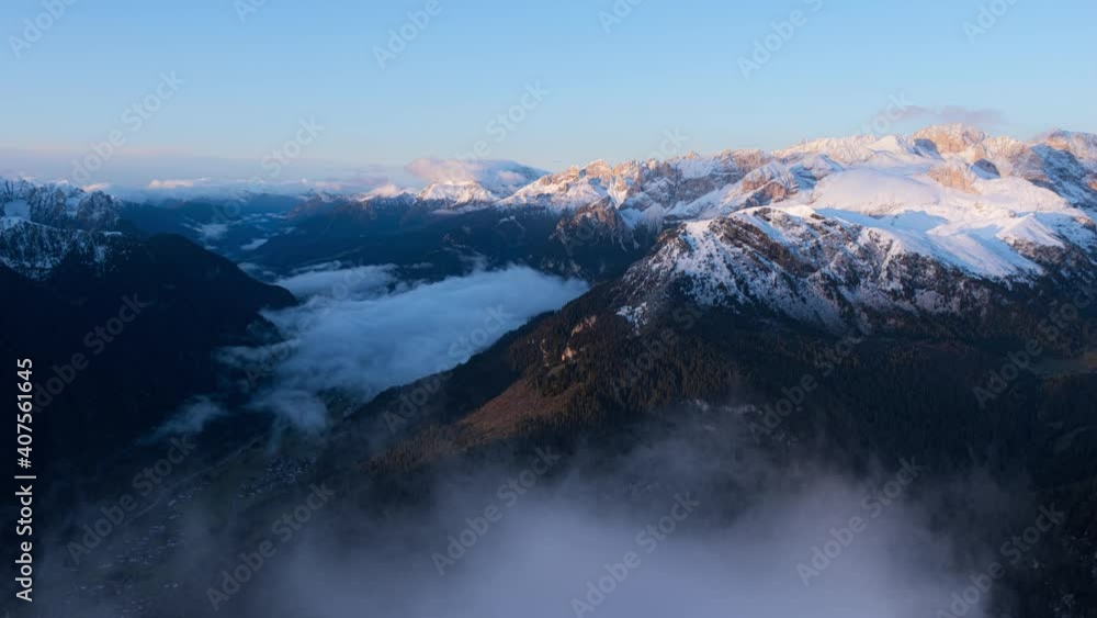 Timelapse of clouds formation in front of camera and beautiful snowy mountain landscape in background during sunny day with clear sky. Alps,Europe. Timelapse of clouds formation in front of camera and beautiful snowy mountain landscape in background during sunny day with clear sky. Alps,Europe.