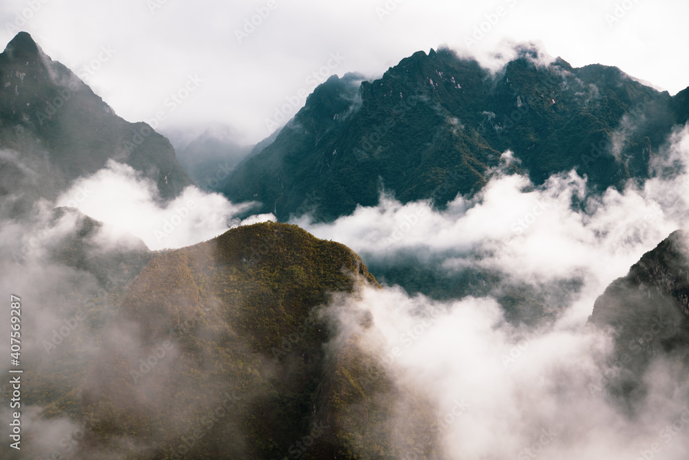 Lush mountain landscape cloaked in clouds