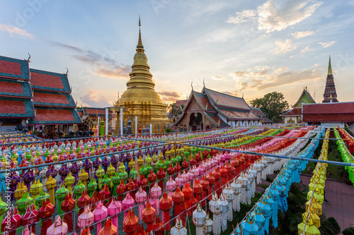 Colorful Lamp Festival and Lantern in Loi Krathong at Wat Phra That Hariphunchai, Lamphun Province, Thailand © Southtownboy Studio