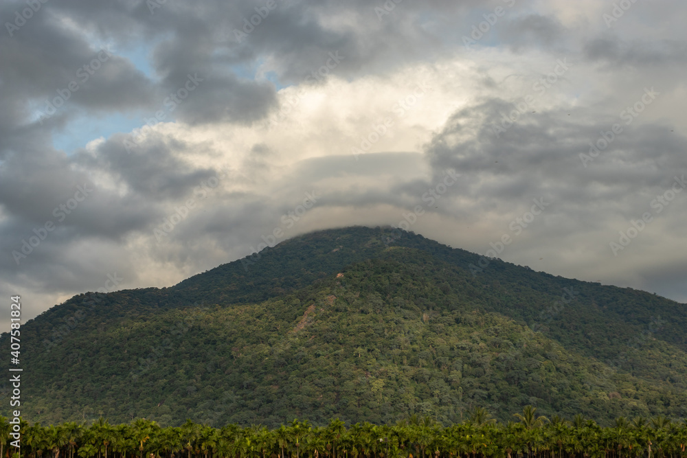 Fototapeta premium Mountains Velliangiri view with blue sky and green forest