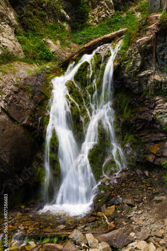 Fototapeta Naklejka Na Ścianę i Meble -  waterfall in the forest mountains