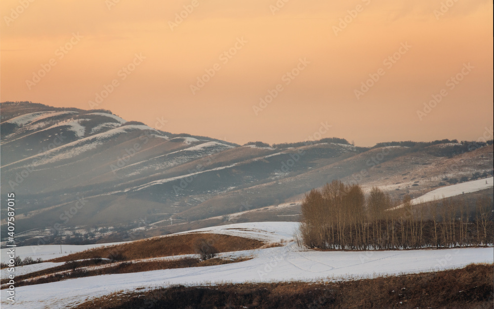 sunset in the mountains in winter