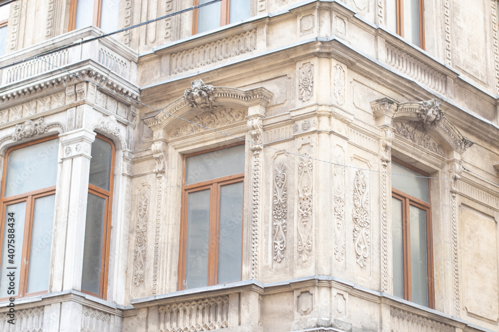 Old european buildings facade with fretwork. Closeup of the of a building, on the streets of Istanbul, Turkey