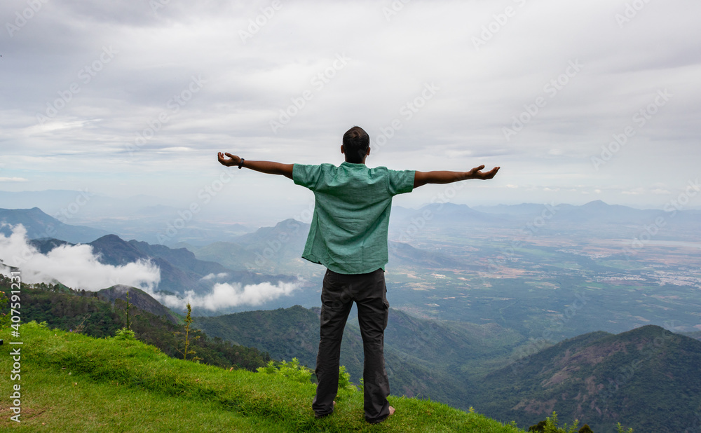 man Isolated soaking natural beauty from hill top man Isolated soaking natural beauty from hill top