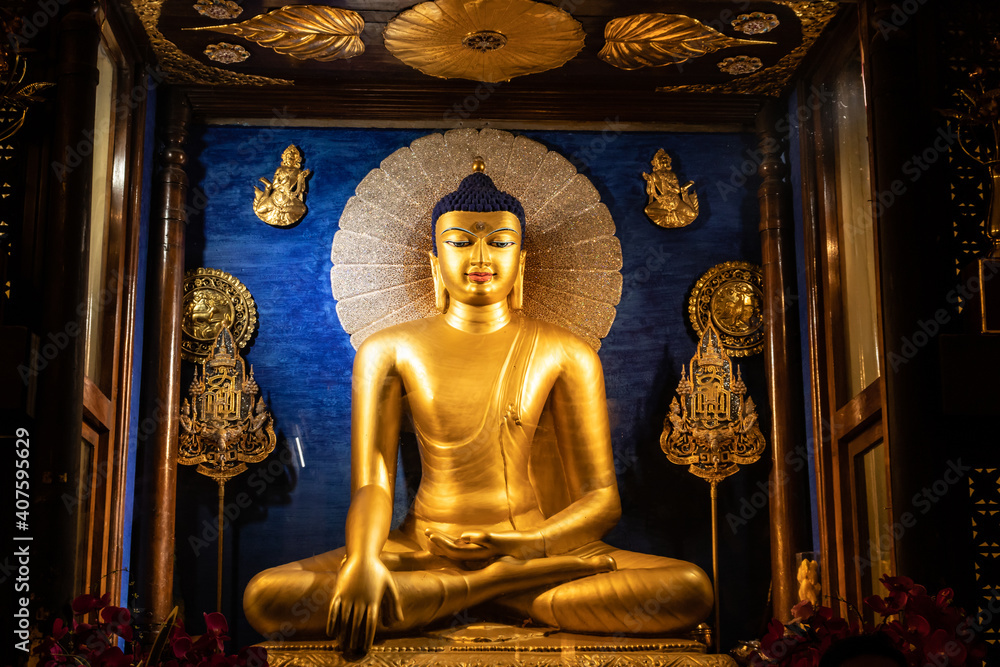 Budhha golden statue isolated in details