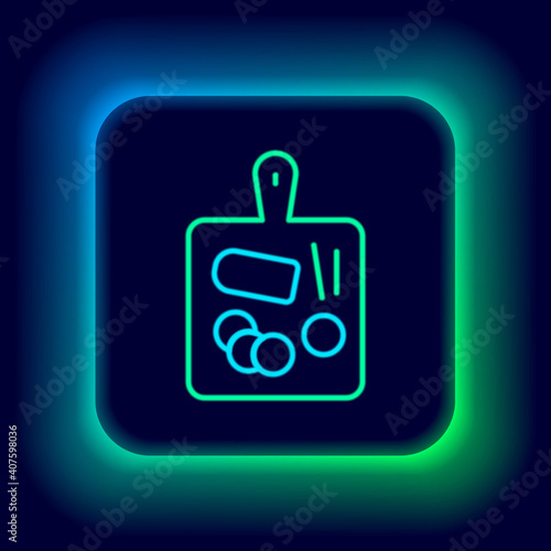 Glowing neon line Cutting board icon isolated on black background. Chopping Board symbol. Colorful outline concept. Vector.