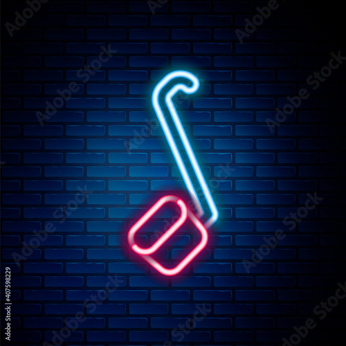 Glowing neon line Sauna ladle icon isolated on brick wall background. Colorful outline concept. Vector.