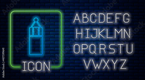 Glowing neon Punching bag icon isolated on brick wall background. Neon light alphabet. Vector.