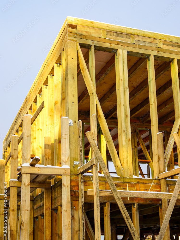 natural wooden construction on the construction site of a two-storey residential house natural wooden construction on the construction site of a two-storey residential house