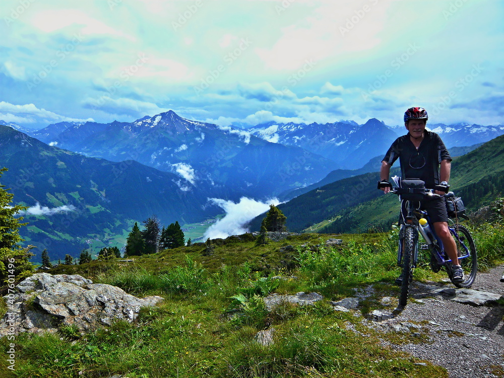 Austrian Alps-cyclist and outlook on the Alps from Zillertaler road