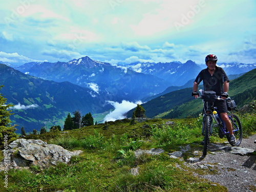 Austrian Alps-cyclist and outlook on the Alps from Zillertaler road