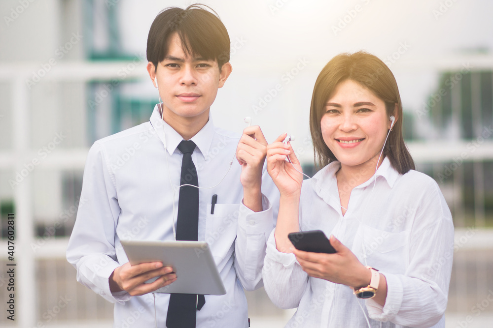 Asian people use mobile smart phone tablet smart technology Asian people use mobile smart phone tablet smart technology