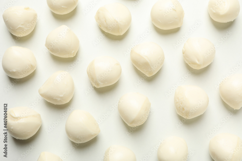 Flat lay with mozzarella cheese on white background