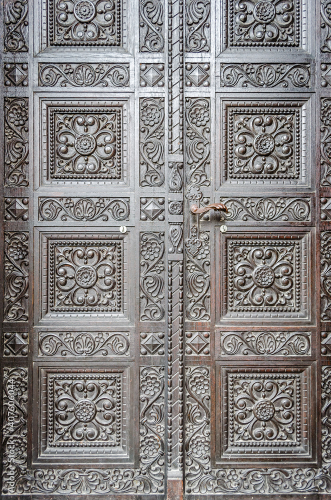 Grandiose metal door with decorations in the center of Timisoara 