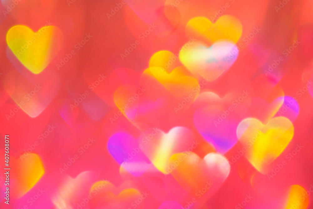 blurred heart shaped holographic bokeh lights background