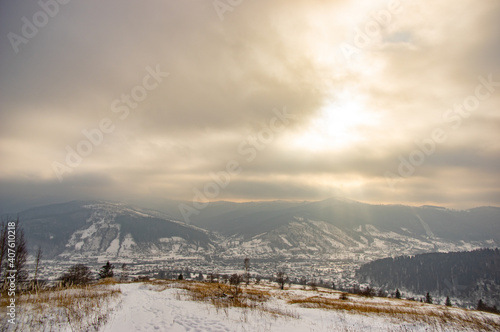 Rural landscape in winter Carpathian mountains