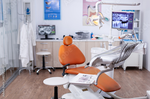 Dentist s office interior with modern chair and special dentisd equipment. The interior of stomatology clinic.