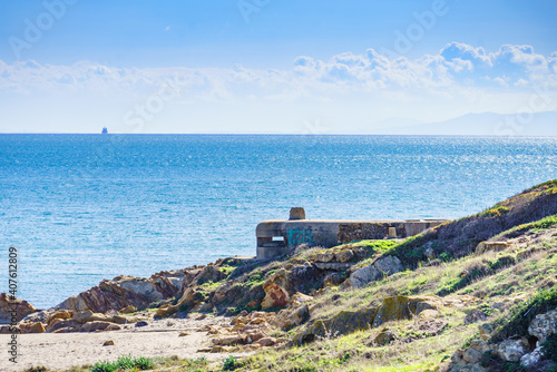 War bunker on the beach coast, Spain photo