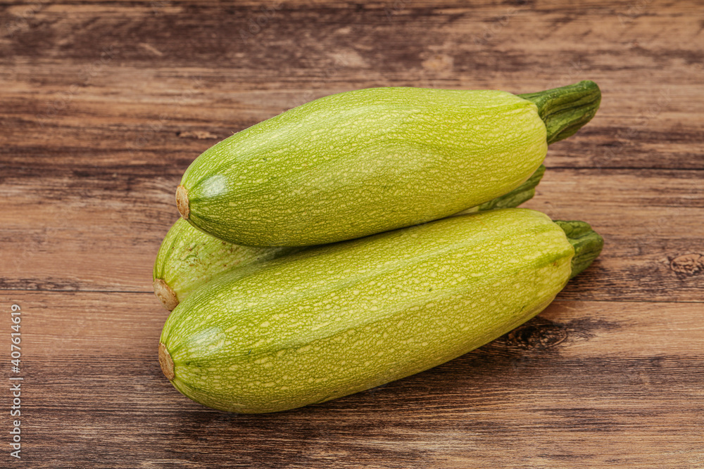 Young tasty zucchini over board Young tasty zucchini over board