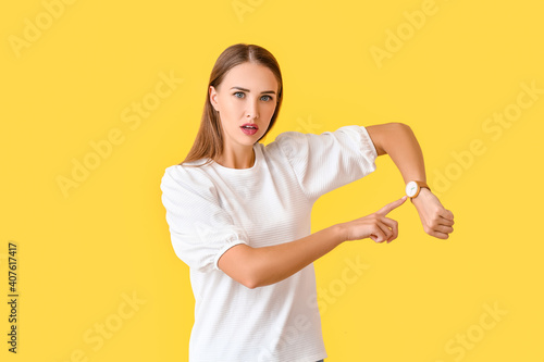 Stressed woman with wristwa...