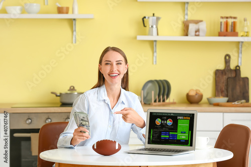 Smiling woman holding money...