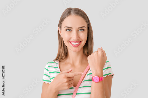 Beautiful woman with wristw...