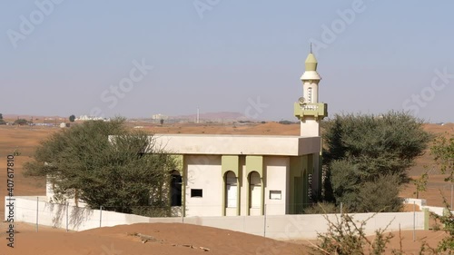 Sand dunes behind the abandoned Mosque in the Al Madam ghost town, Sharjah