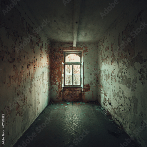 Derelict, empty room in an abandoned building