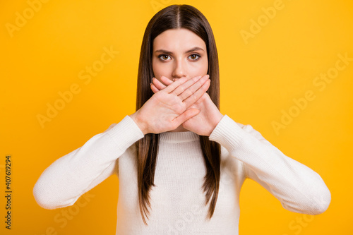 Quadro em tela Portrait of young person arms palms crossed covering mouth do not speaking isola