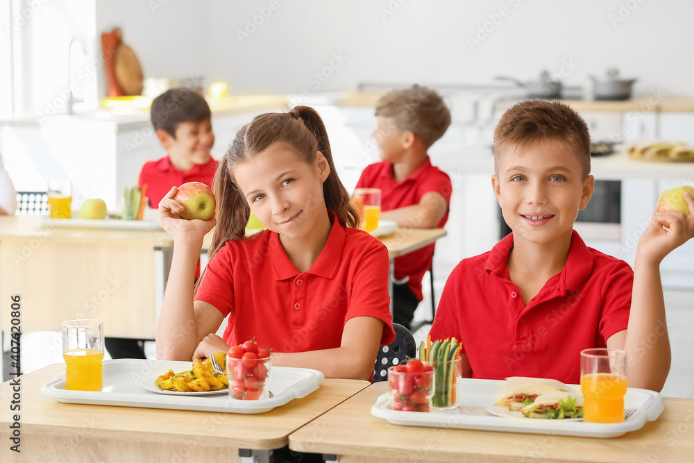 Pupils having healthy lunch in classroom Pupils having healthy lunch in classroom