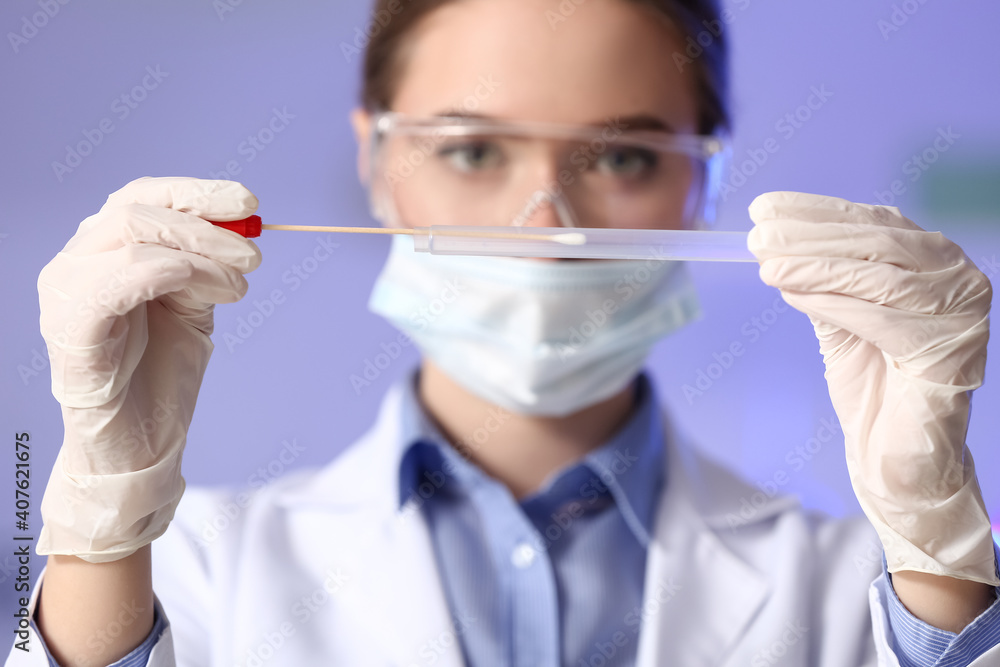 Scientist with sample of covid-19 in laboratory Scientist with sample of covid-19 in laboratory
