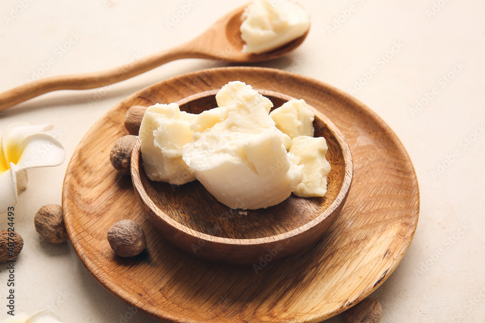 Plate with shea butter on table Plate with shea butter on table