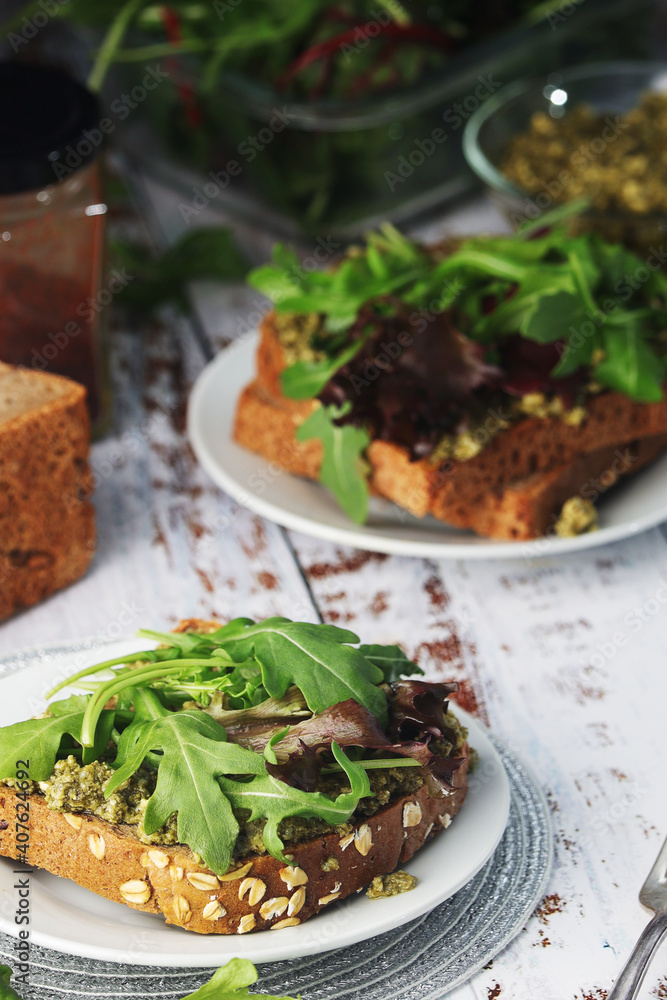 Sandwiches with pesto and green salad Sandwiches with pesto and green salad
